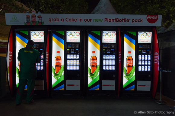 A Cameroon athlete enjoying a late night Coke